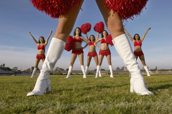 Cheerleaders with pom poms — Stock Photo, Image