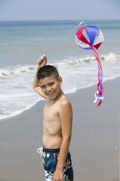 Boy with kite on beach — Stock Photo, Image