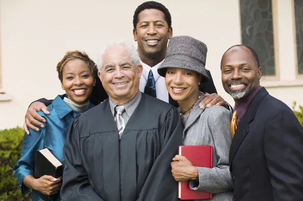 Minister with Family — Stock Photo, Image