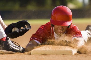 Baseball player sliding 