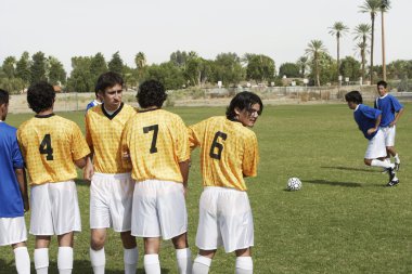 Players Preparing for a Penalty Kick clipart