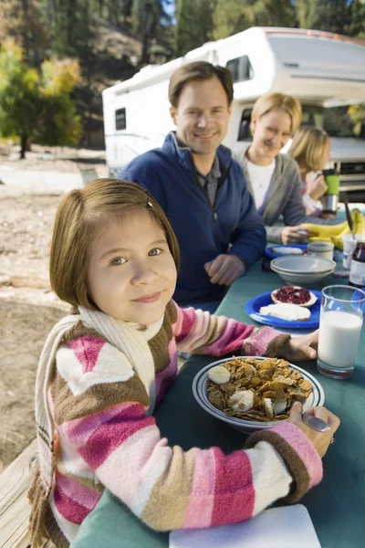 Picnic table with family — Stock Photo, Image