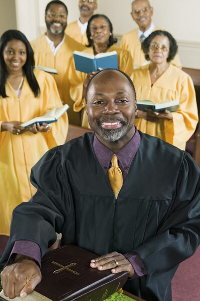 Minister with Bible amd gospel choir