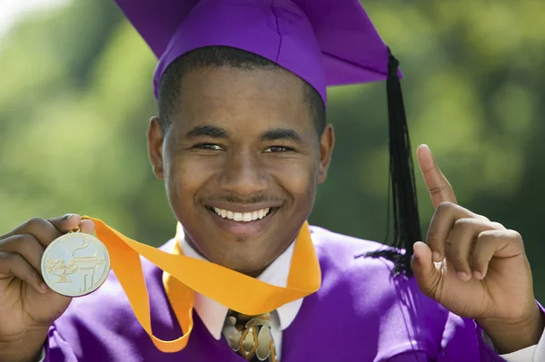 Graduate with medal — Stock Photo, Image