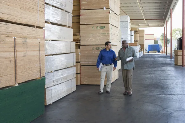 Men with clipboards — Stock Photo, Image