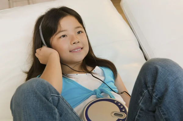 Girl Listening to Music on CD Player — Stock Photo, Image