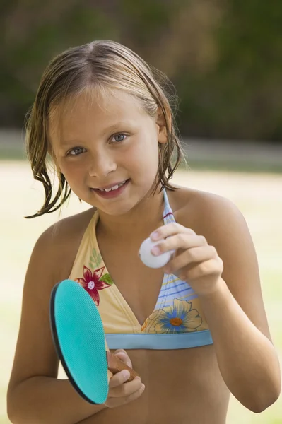 Girl holding table tennis paddle — Stock Photo, Image