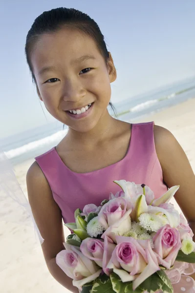 Bridesmaid with flowers — Stock Photo, Image