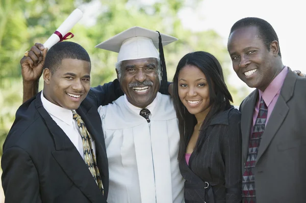 Graduate with Sons and Daughter — Stock Photo, Image