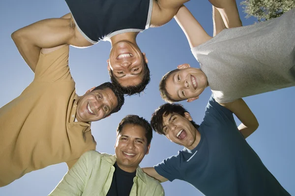 Men in a Huddle — Stock Photo, Image