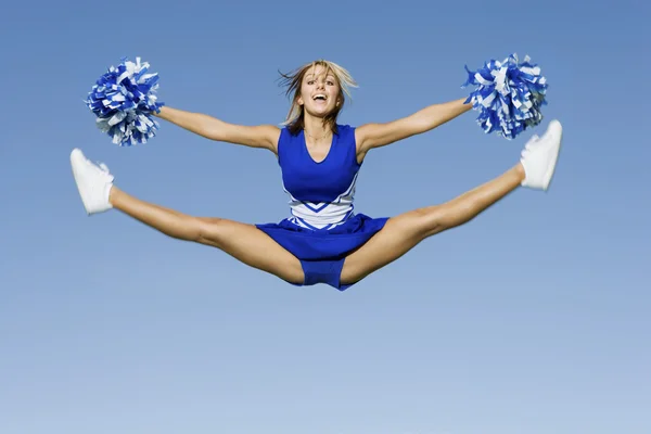 Cheerleader  doing splits — Stock Photo, Image