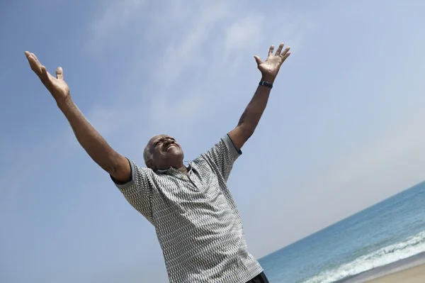 Man with arms outstretched — Stock Photo, Image