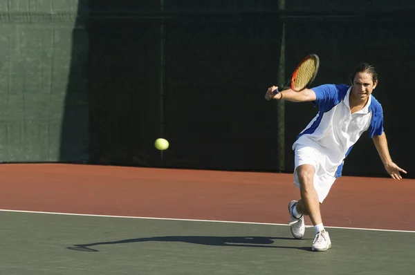 Tennis Player Hitting Backhand — Stock Photo, Image