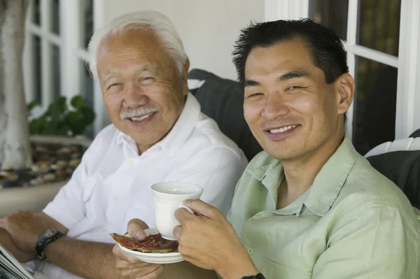 Father and Son Drinking Coffee — Stock Photo, Image
