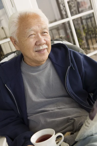 Senior man with coffee — Stock Photo, Image