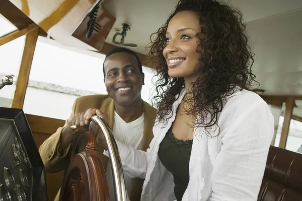 Couple at steering wheel — Stock Photo, Image
