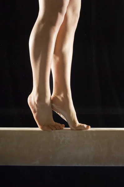 Gymnast on balance beam — Stock Photo, Image