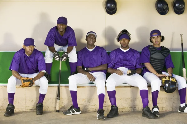 Baseballspieler sitzen — Stockfoto