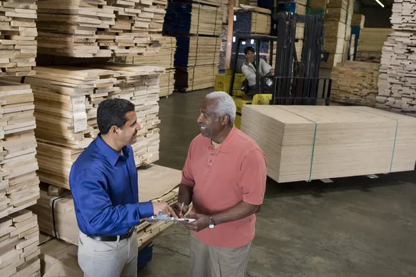 Men stock-taking in warehouse — Stock Photo, Image