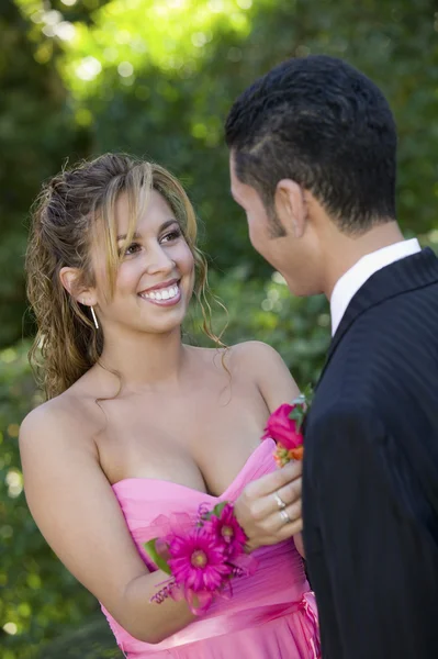 Girl Pinning Boutonniere on Date — Stock Photo, Image