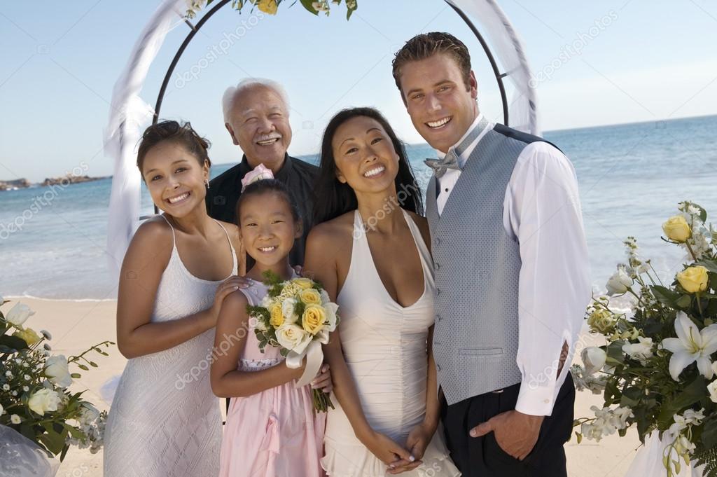 Bride and groom with family — Stock Photo © londondeposit #33800985