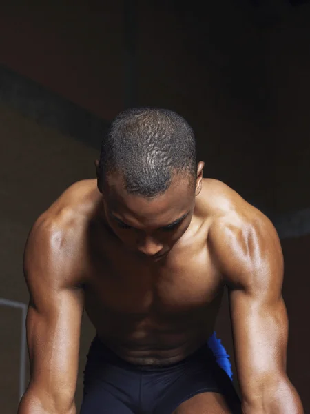 Runner crouching down — Stock Photo, Image