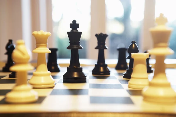 Chess pieces on chess board — Stock Photo, Image