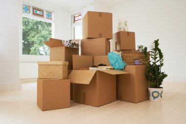 Stack of Boxes in New House clipart
