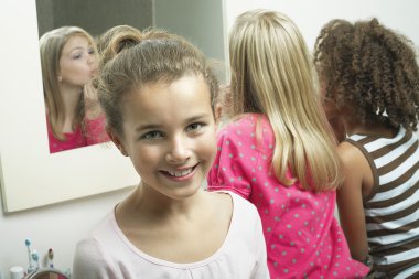 girl in bathroom with friends clipart