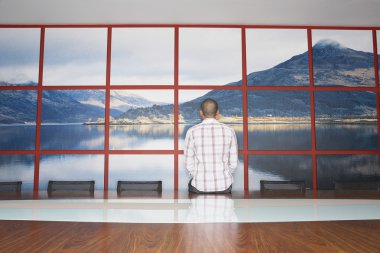 Man Staring at Wall Photo clipart