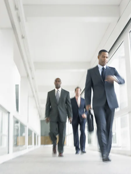 Businessmen walking down — Stock Photo, Image