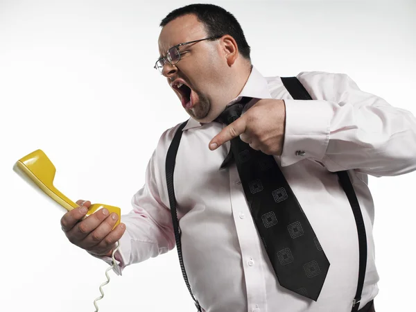 Businessman yelling at phone — Stock Photo, Image