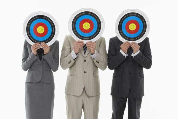 Business people holding targets — Stock Photo, Image