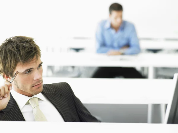 Empresário contemplando — Fotografia de Stock