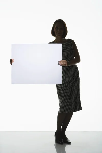Silhouet vrouw met grote lege kaart — Stockfoto