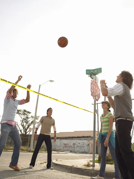 Friends playing volleyball