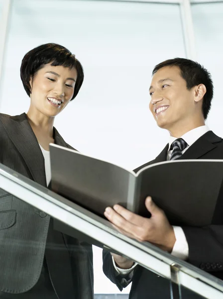 Business colleagues reviewing documents — Stock Photo, Image