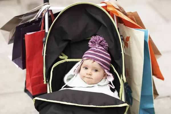 Baby sitting in stroller — Stock Photo, Image