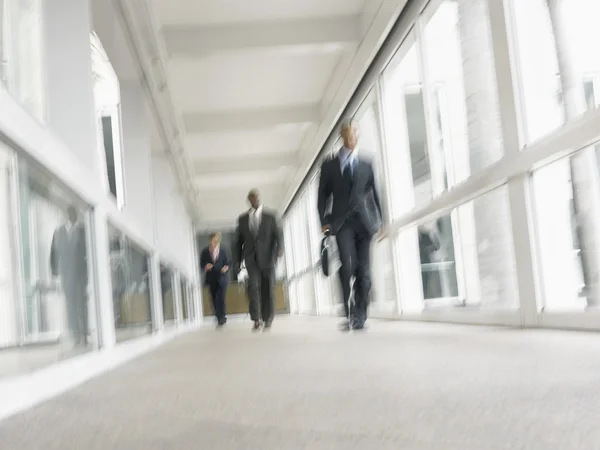 Businessmen walking down — Stock Photo, Image