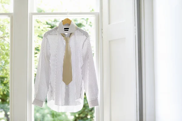 Shirt and tie on hanger — Stock Photo, Image