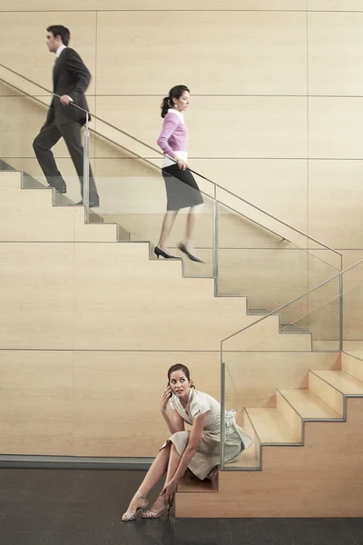 Business people on Stairway — Stock Photo, Image