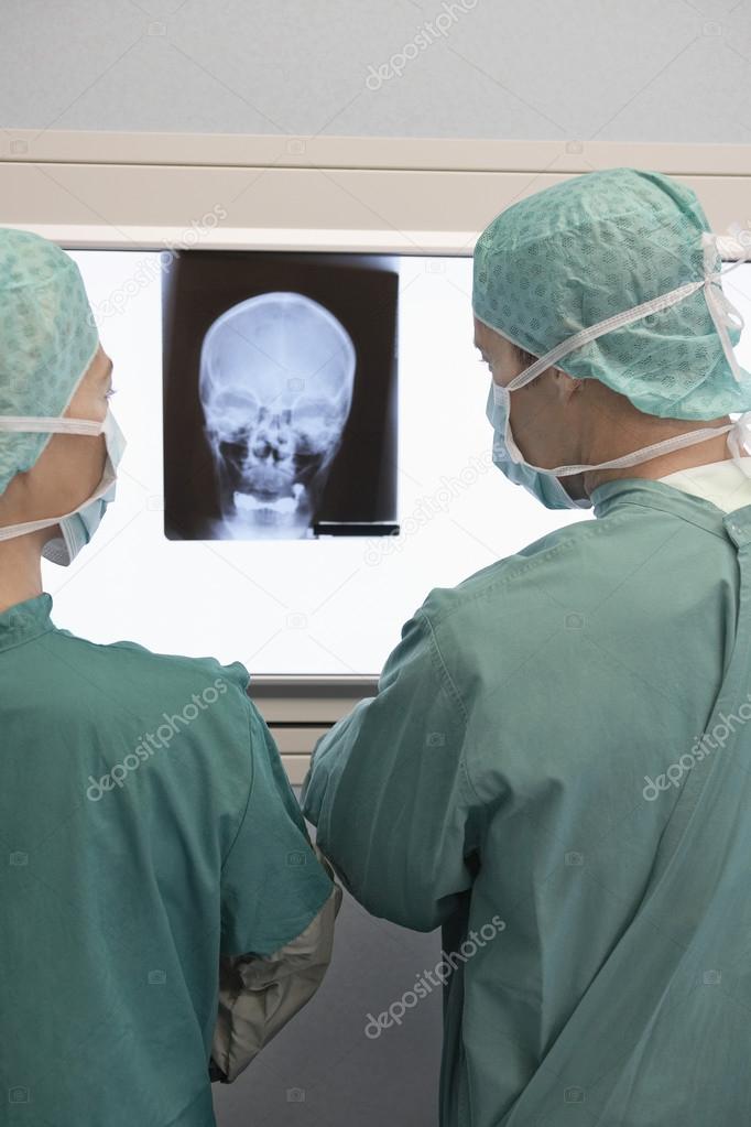 Radiologists Examining X-Ray