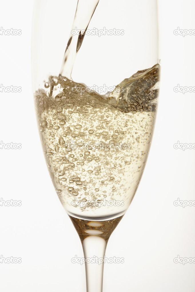 Champagne Being Poured into Glass