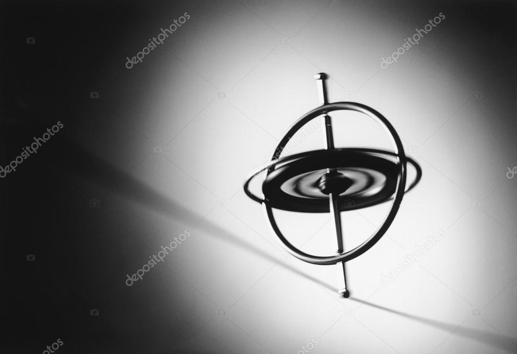 Spinning Gyroscope on Wire — Stock Photo © londondeposit 33825385