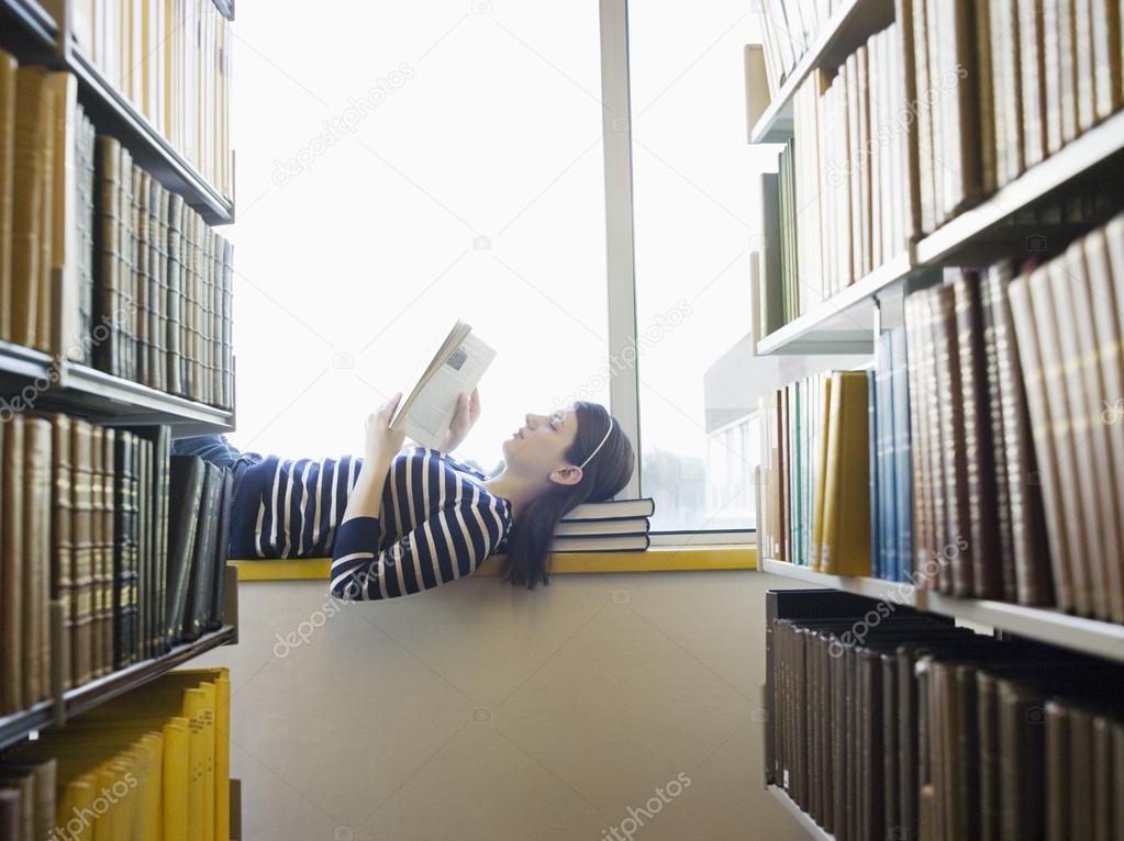 Student lying down on windowsill