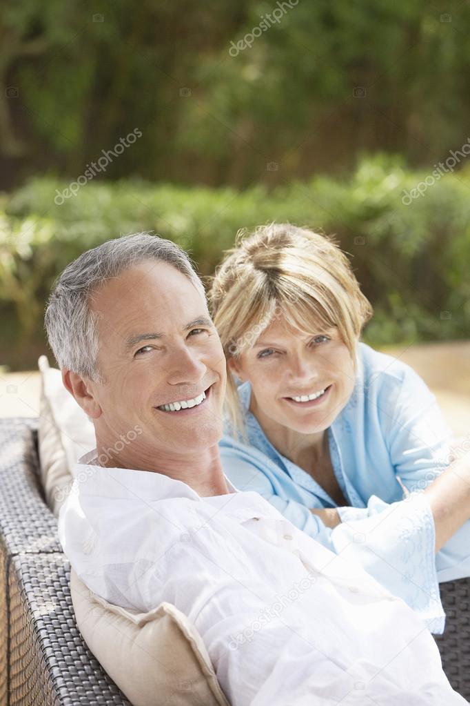 Couple sitting outdoors