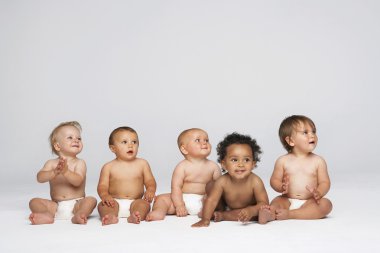 multiethnic babies  looking away clipart