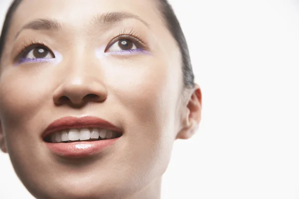 Young Asian woman looking up — Stock Photo, Image