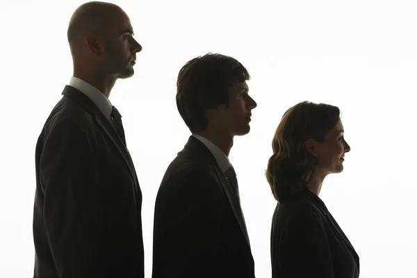 Businesspeople standing in row — Stock Photo, Image