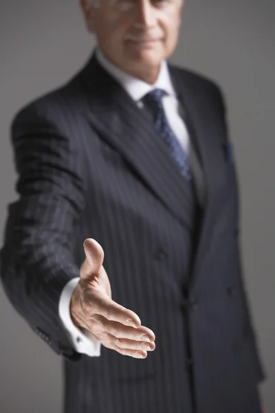 Businessman Offering Hand — Stock Photo, Image